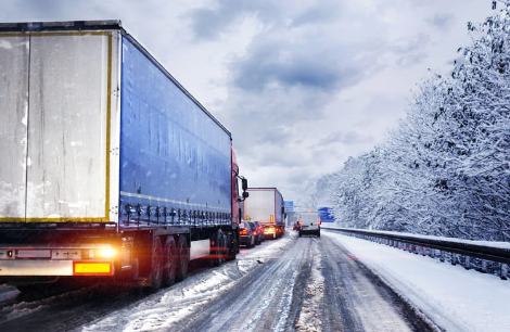 trucks driving in snow