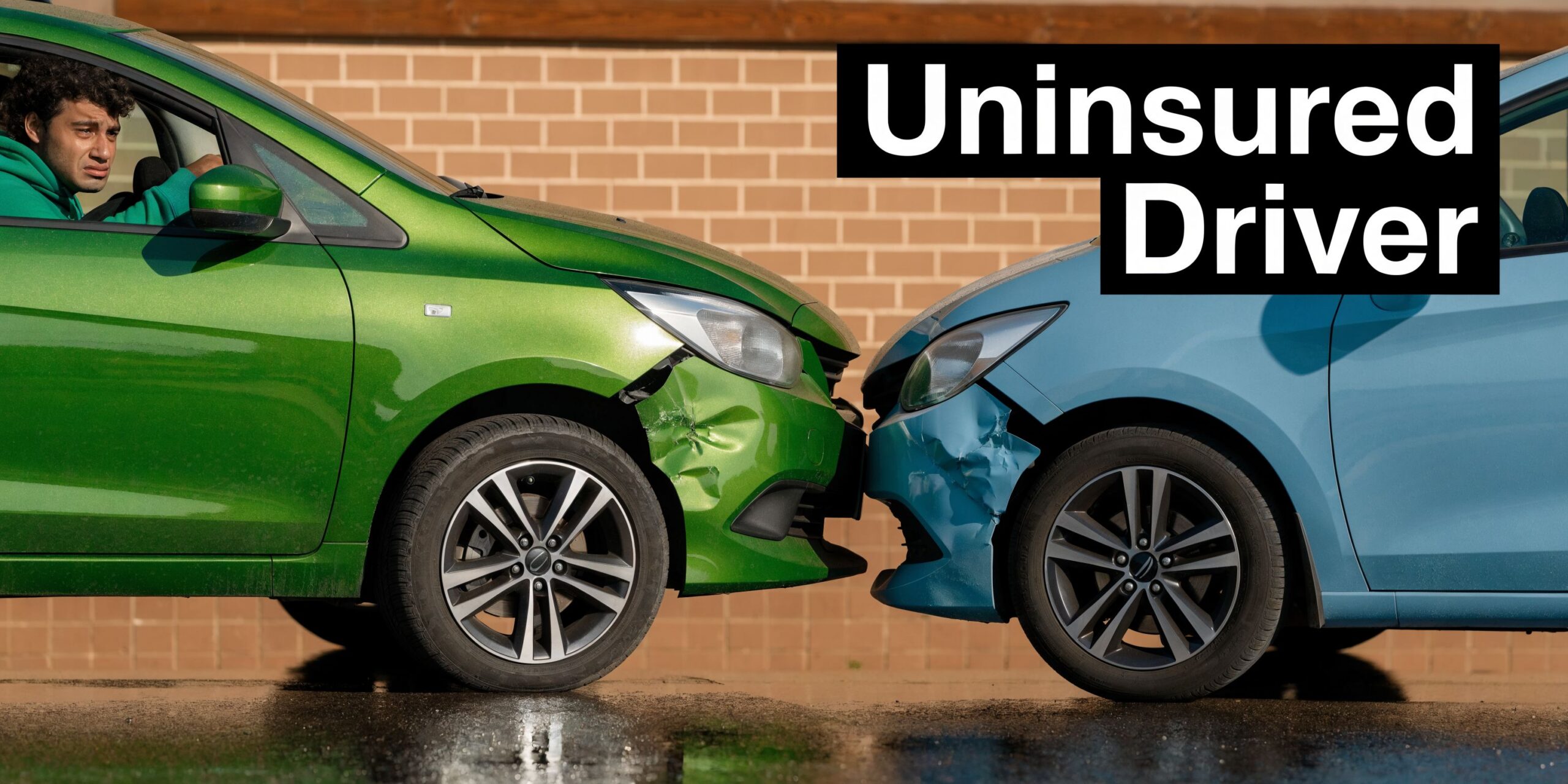 A green car and a blue car that have been involved in a minor collision